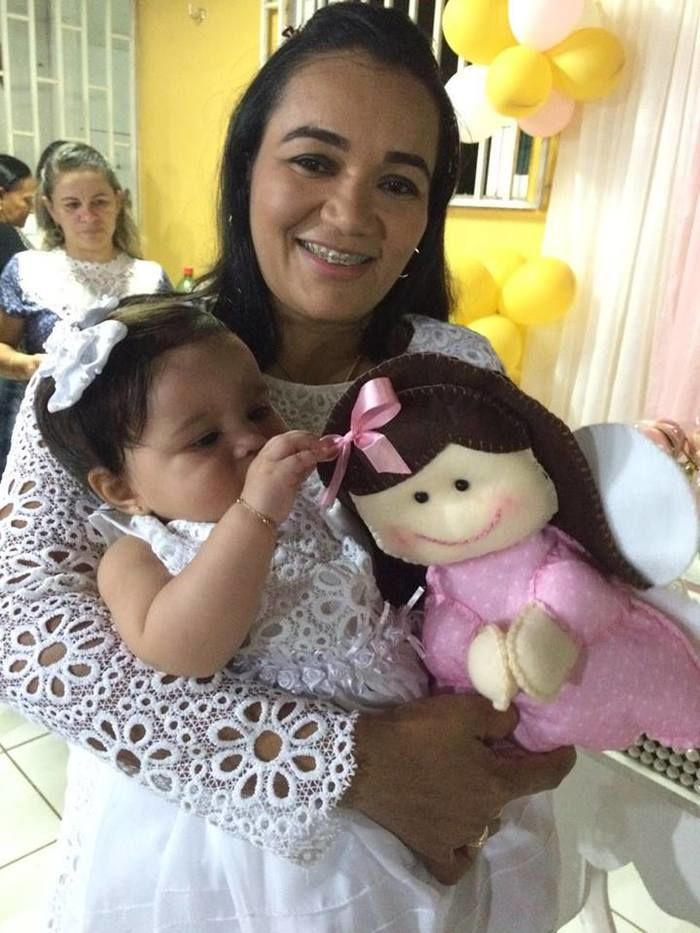 Celebração religiosa do Batizado de Maria Lucia. - Imagem 6