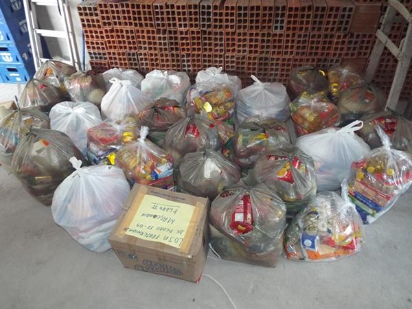Rádio Cruzeiro AM concretiza campanha solidária com entrega de cestas de alimento  - Imagem 6
