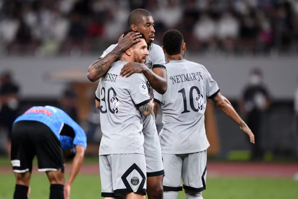 Messi comemora com Kimpembe | Foto: Getty Images